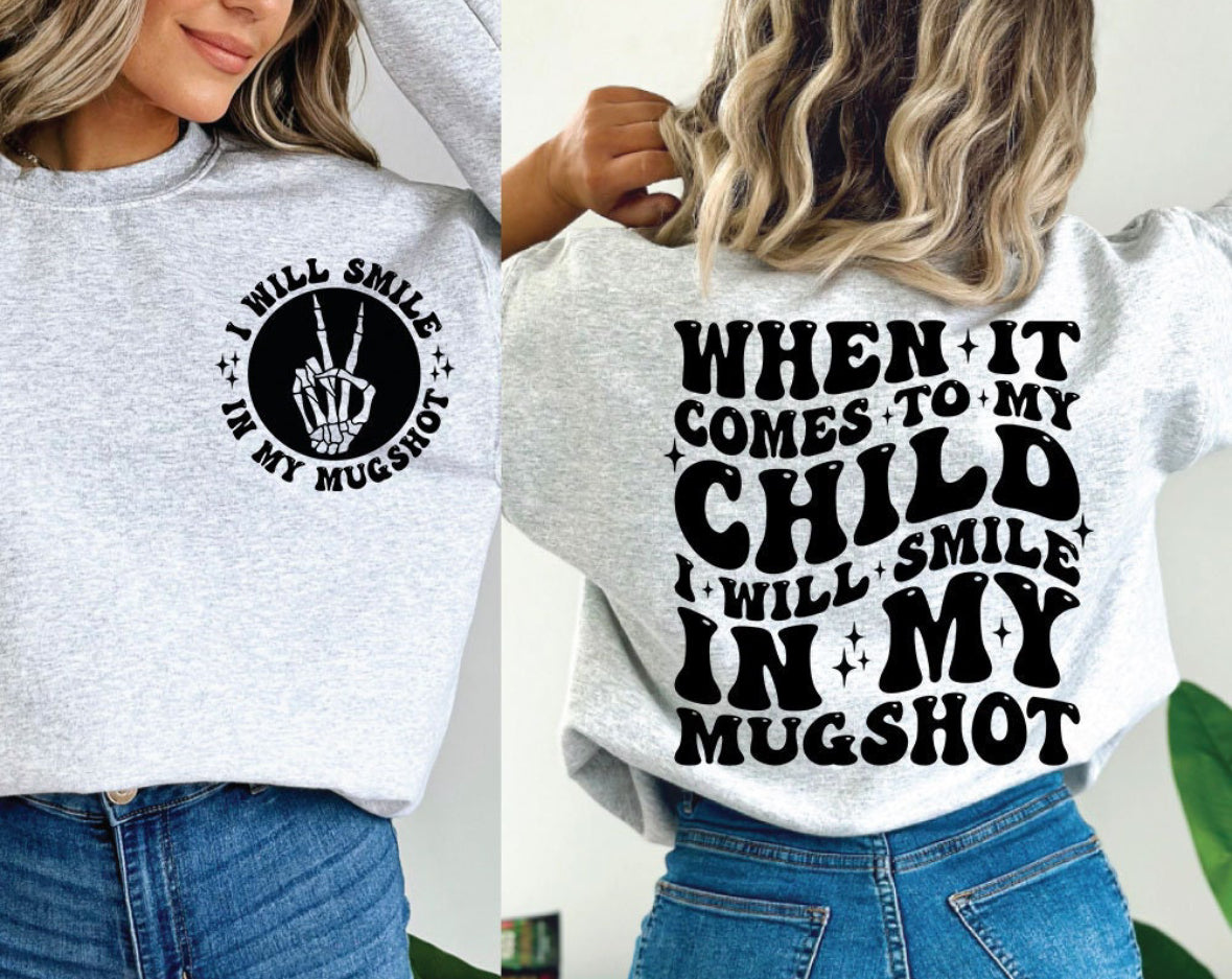 Smile in my mugshot (front & back)
